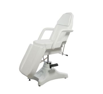 Fauteuil de soins hydraulique caréné.